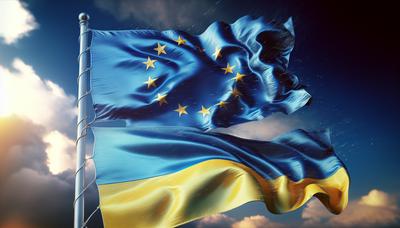 Les drapeaux de l'UE et de l'Ukraine secoués par un vent turbulent.