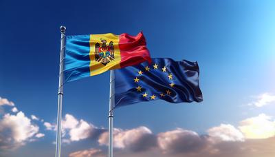 Banderas de Moldavia y de la UE ondeando contra el cielo azul.